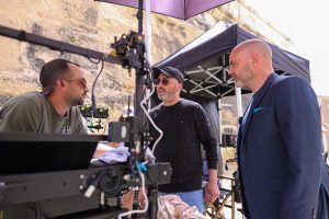 Malta Film Commissioner Minister Owen Bonnici meeting crew on set.